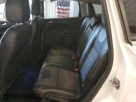 2013 Ford Escape Titanium z VIN 1FMCU0J97DUD36625, wystawiony jako Copart lot #55961815 z przebiegiem 163 327 mil mil oraz Szkoda całkowita • Salvage title. Historia ofert i sprzedaży dostępna na DreamBid. Obrazek 11.