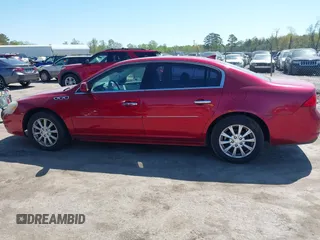 2011 Buick Lucerne CXL with VIN 1G4HC5EM9BU100396, listed as a IAAI auction lot 41952470 with 201,360 mi miles and . Bid and sale history available at DreamBid. Image 14.