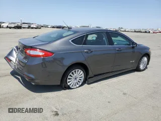2016 Ford Fusion SE Hybrid with VIN 3FA6P0LU9GR166408, listed as a Copart auction lot 59931995 with 104,560 mi miles and Salvage title. Bid and sale history available at DreamBid. Image 3.