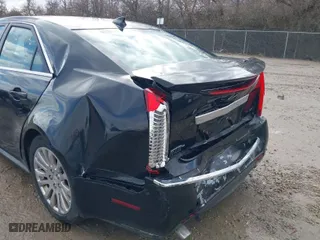 2011 Cadillac CTS Sedan Performance with VIN 1G6DL5ED6B0151304, listed as a IAAI auction lot 41720093 with 197,861 mi miles. Bid and sale history available at carsss.com. Image 20.