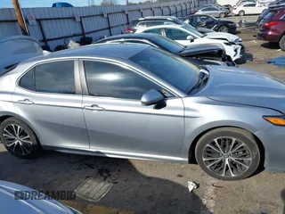 2019 Toyota Camry LE z VIN 4T1B11HK8KU681713, wystawiony jako IAAI lot #41823019 z przebiegiem 99 000 mil mil oraz . Historia ofert i sprzedaży dostępna na DreamBid. Obrazek 13.