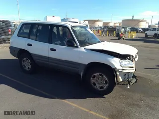 1999 Toyota RAV4 with VIN JT3HP10V1X7121898, listed as a IAAI auction lot 34935963 with 286,449 mi miles. Bid and sale history available at carsss.com. Image 1.