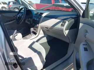 2011 Toyota Corolla L with VIN JTDBU4EE0B9151332, listed as a IAAI auction lot 41970433 with 113,157 mi miles. Bid and sale history available at carsss.com. Image 5.
