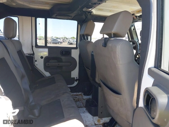 2010 Jeep Wrangler Unlimited Sport with VIN 1J4BA3H1XAL102159, listed as a IAAI auction lot 40190164 with 262,194 mi miles. Bid and sale history available at carsss.com. Image 8.