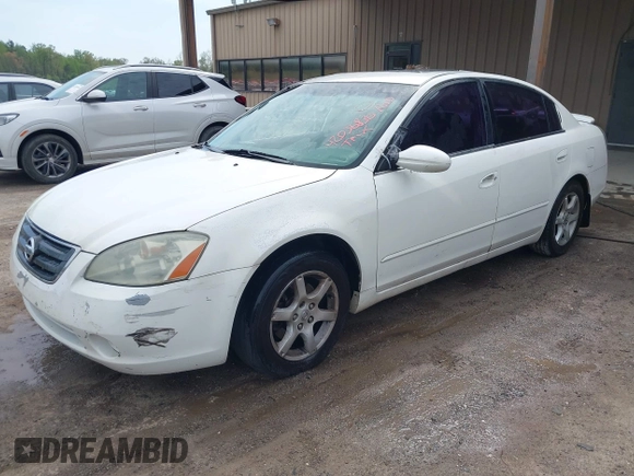 2002 Nissan Altima S with VIN 1N4AL11D92C137996, listed as a IAAI auction lot 42036830 with 227,793 mi miles. Bid and sale history available at carsss.com. Image 2.