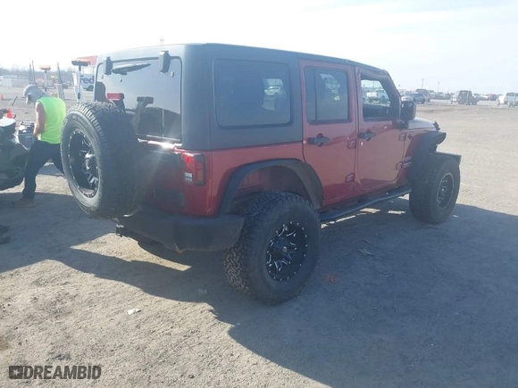 2012 Jeep Wrangler Unlimited Sport with VIN 1C4BJWDGXCL163905, listed as a IAAI auction lot 41784769 with 142,954 mi miles. Bid and sale history available at carsss.com. Image 4.