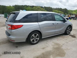 2018 Honda Odyssey Touring with VIN 5FNRL6H81JB078091, listed as a Copart auction lot 51372075 with 104,144 mi miles and Salvage Title. Bid and sale history available at carsss.com. Image 3.