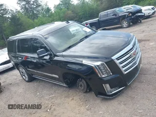 2016 Cadillac Escalade Platinum z VIN 1GYS3DKJ7GR374845, wystawiony jako IAAI lot #41951693 z przebiegiem 93 820 mil mil oraz . Historia ofert i sprzedaży dostępna na DreamBid. Obrazek 13.