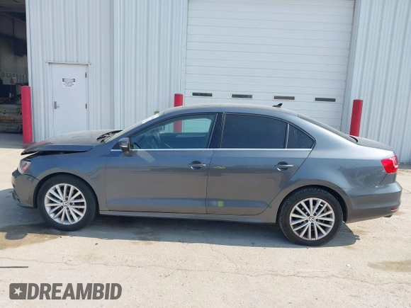 2015 Volkswagen Jetta SE with VIN 3VWD07AJ2FM310154, listed as a IAAI auction lot 42456136 with 96,979 mi miles and . Bid and sale history available at DreamBid. Image 14.