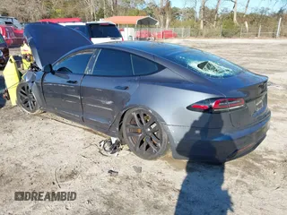 2022 Tesla Model S with VIN 5YJSA1E54NF488443, listed as a IAAI auction lot 41289281 with Not Provided miles and . Bid and sale history available at DreamBid. Image 3.