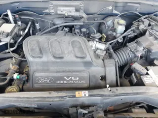 2002 Ford Escape XLT with VIN 1FMCU031X2KA37050, listed as a IAAI auction lot 42024674 with 199,249 mi miles. Bid and sale history available at carsss.com. Image 10.