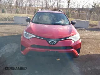 2016 Toyota RAV4 LE with VIN JTMBFREVXGJ100692, listed as a IAAI auction lot 41847333 with 130,822 mi miles. Bid and sale history available at carsss.com. Image 12.