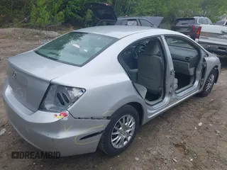 2012 Honda Civic LX with VIN 2HGFB2F59CH570602, listed as a IAAI auction lot 42241041 with 134,134 mi miles and . Bid and sale history available at DreamBid. Image 4.