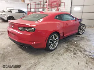 2021 Chevrolet Camaro 2LT with VIN 1G1FD1RSXM0104809, listed as a IAAI auction lot 41294623 with 164,533 mi miles. Bid and sale history available at carsss.com. Image 4.