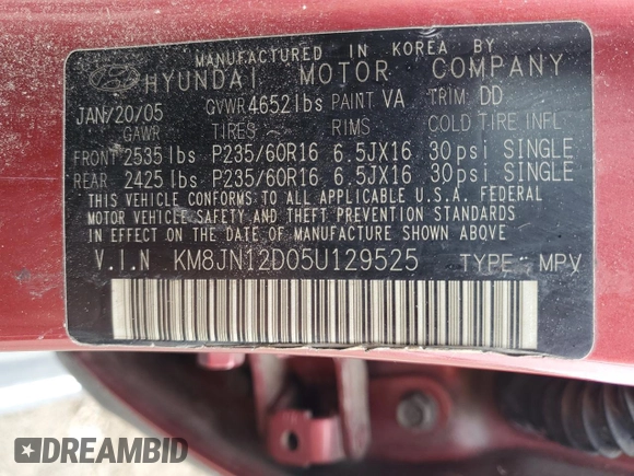 2005 Hyundai Tucson GLS with VIN KM8JN12D05U129525, listed as a Copart auction lot 79690934 with 169,061 mi miles and Salvage Title. Bid and sale history available at carsss.com. Image 13.