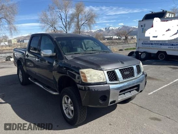 2004 Nissan Titan LE with VIN 1N6AA07A84N590583, listed as a Copart auction lot 49112705 with 92,426 mi miles and Salvage Title. Bid and sale history available at DreamBid. Image 1.