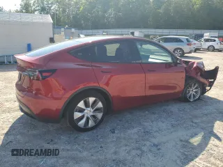 2024 Tesla Model Y Long Range z VIN 7SAYGAEEXRF071829, wystawiony jako Copart lot #56003215 z przebiegiem 29 446 mil mil oraz Szkoda całkowita • Salvage title. Historia ofert i sprzedaży dostępna na DreamBid. Obrazek 3.