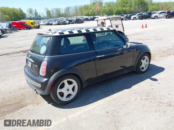 2003 MINI Hardtop with VIN WMWRC33463TC41773, listed as a IAAI auction lot 42223276 with 115,127 mi miles and . Bid and sale history available at DreamBid. Image 4.