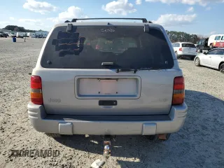 1998 Jeep Grand Cherokee with VIN 1J4GX48Y7WC216585, listed as a Copart auction lot 83532184 with 144,739 mi miles and Salvage title. Bid and sale history available at DreamBid. Image 6.
