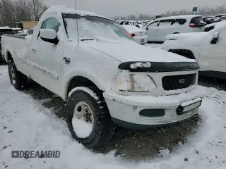 1998 Ford F-150 with VIN 1FTRF18L9WNB61551, listed as a Copart auction lot 82864544 with Not provided miles and Salvage title. Bid and sale history available at DreamBid. Image 11.