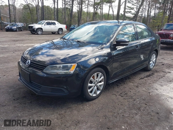 2012 Volkswagen Jetta SE with VIN 3VWDX7AJ5CM351398, listed as a IAAI auction lot 41734647 with 229,671 mi miles and . Bid and sale history available at DreamBid. Image 2.