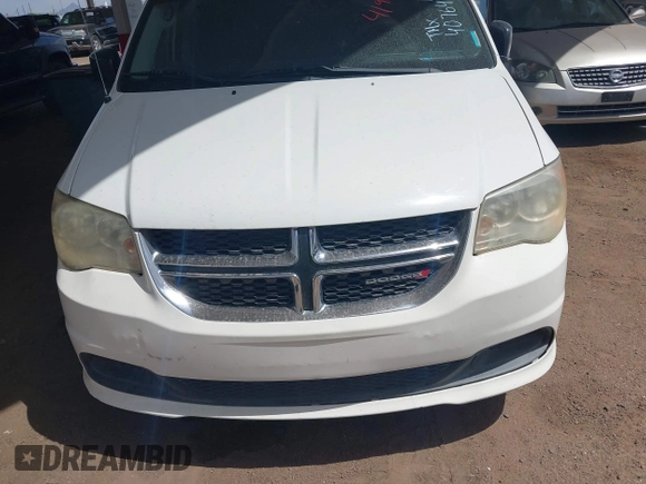 2012 Dodge Grand Caravan SE with VIN 2C4RDGBGXCR407641, listed as a IAAI auction lot 41950812 with 151,331 mi miles and . Bid and sale history available at DreamBid. Image 6.