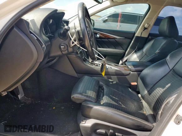 2015 Infiniti Q50 Sport with VIN JN1BV7AP5FM346998, listed as a Copart auction lot 61992655 with 105,215 mi miles and Salvage title. Bid and sale history available at DreamBid. Image 7.