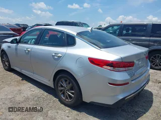 2019 Kia Optima LX with VIN 5XXGT4L3XKG345802, listed as a IAAI auction lot 42609317 with 74,664 mi miles and . Bid and sale history available at DreamBid. Image 3.