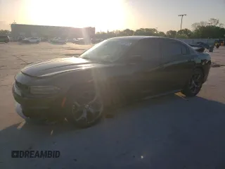 2015 Dodge Charger SXT z VIN 2C3CDXHG0FH866849, wystawiony jako Copart lot #52026055 z przebiegiem 111 043 mil mil oraz Szkoda całkowita • Salvage title. Historia ofert i sprzedaży dostępna na DreamBid. Obrazek 1.