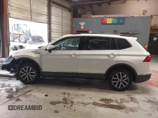 2020 Volkswagen Tiguan SE with VIN 3VV3B7AX4LM141023, listed as a IAAI auction lot 41521923 with 69,479 mi miles and . Bid and sale history available at DreamBid. Image 15.