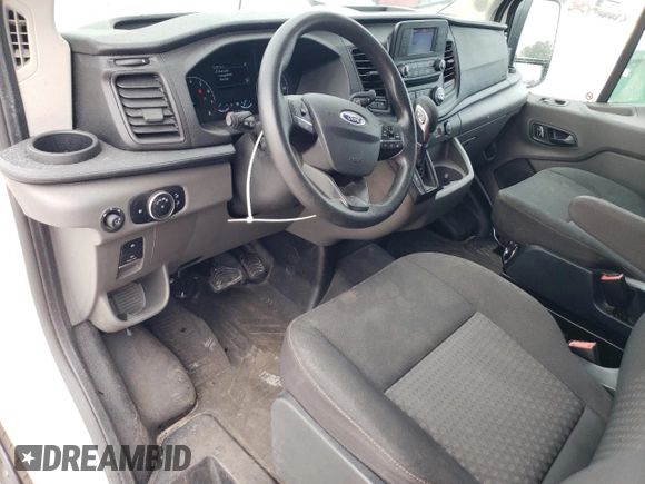 2023 Ford Transit Cargo with VIN 1FTBR1Y83PKA29926, listed as a Copart auction lot 83096634 with 22,496 mi miles and Clean Title. Bid and sale history available at DreamBid. Image 8.