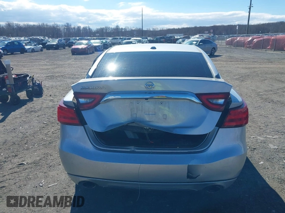 2016 Nissan Maxima SV z VIN 1N4AA6AP4GC446635, wystawiony jako IAAI lot #41672861 z przebiegiem 118 377 mil mil oraz . Historia ofert i sprzedaży dostępna na DreamBid. Obrazek 17.