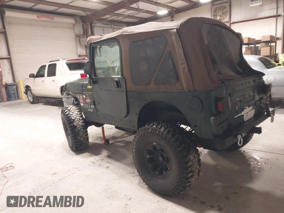 2000 Jeep Wrangler Sahara with VIN 1J4FA59S4YP788741, listed as a IAAI auction lot 41427876 with 209,434 mi miles. Bid and sale history available at carsss.com. Image 3.