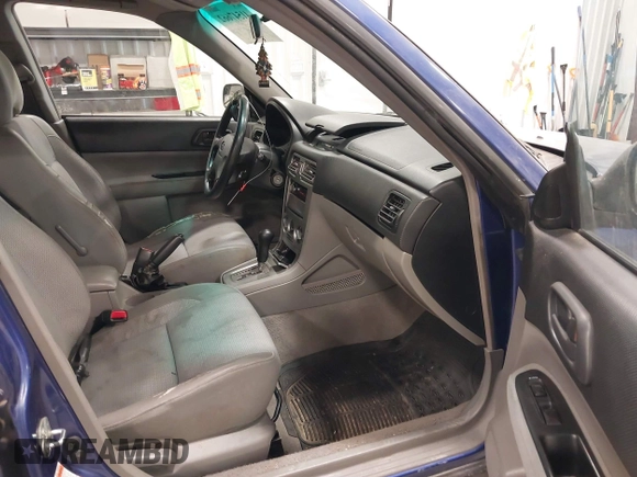 2003 Subaru Forester X with VIN JF1SG63663H708501, listed as a IAAI auction lot 41547662 with 208,134 mi miles. Bid and sale history available at carsss.com. Image 5.