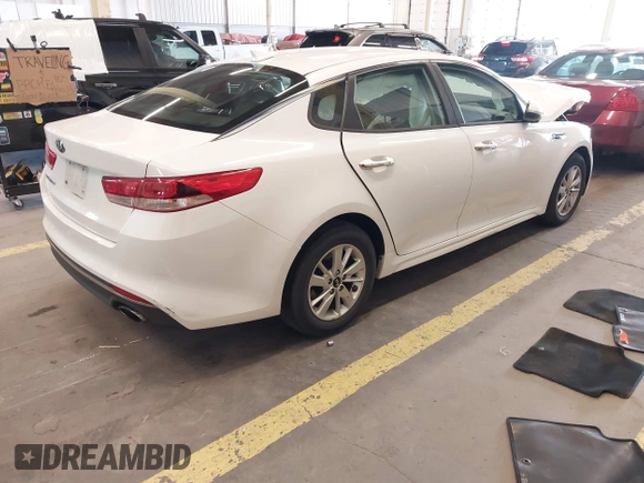 2017 Kia Optima LX with VIN 5XXGT4L35HG135391, listed as a IAAI auction lot 42316564 with 119,940 mi miles and . Bid and sale history available at DreamBid. Image 4.
