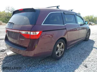 2013 Honda Odyssey Touring with VIN 5FNRL5H96DB037947, listed as a IAAI auction lot 41813910 with 231,920 mi miles. Bid and sale history available at carsss.com. Image 4.