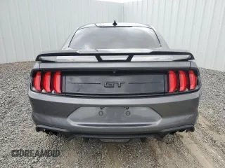 2021 Ford Mustang GT z VIN 1FA6P8CF8M5133205, wystawiony jako Copart lot #46677945 z przebiegiem Nie podano mil oraz Tytuł czysty. Historia ofert i sprzedaży dostępna na DreamBid. Obrazek 6.