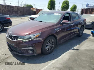 2020 Kia Optima LX z VIN 5XXGT4L31LG380181, wystawiony jako Copart lot #62310785 z przebiegiem 185 649 mil mil oraz Czysty tytuł • Clean title. Historia ofert i sprzedaży dostępna na DreamBid. Obrazek 1.