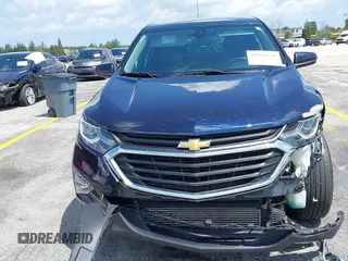2020 Chevrolet Equinox LT with VIN 3GNAXJEV5LS592266, listed as a IAAI auction lot 41924328 with 61,574 mi miles and . Bid and sale history available at DreamBid. Image 6.