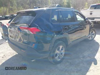 2022 Toyota RAV4 Hybrid XLE z VIN 4T3RWRFV0NU054821, wystawiony jako IAAI lot #42144555 z przebiegiem 29 485 mil mil oraz . Historia ofert i sprzedaży dostępna na DreamBid. Obrazek 4.