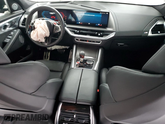 2023 BMW XM z VIN 5YM23CS05P9S28460, wystawiony jako Copart lot #41641905 z przebiegiem 9700 mil mil oraz Szkody całkowita. Historia ofert i sprzedaży dostępna na DreamBid. Obrazek 8.