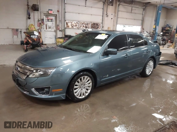 2012 Ford Fusion Hybrid z VIN 3FADP0L31CR443545, wystawiony jako IAAI lot #42028774 z przebiegiem 194 365 mil mil oraz . Historia ofert i sprzedaży dostępna na DreamBid. Obrazek 2.