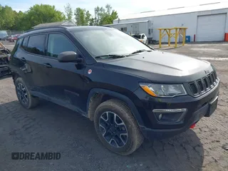 2020 Jeep Compass Trailhawk z VIN 3C4NJDDB7LT195317, wystawiony jako IAAI lot #42325122 z przebiegiem 97 858 mil mil oraz . Historia ofert i sprzedaży dostępna na DreamBid. Obrazek 1.