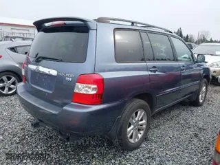 2006 Toyota Highlander Hybrid with VIN JTEEW21A260023243, listed as a IAAI auction lot 41778209 with 230,228 mi miles. Bid and sale history available at carsss.com. Image 4.