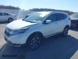 2018 Honda CR-V Touring with VIN 2HKRW2H96JH655742, listed as a IAAI auction lot 41763219 with 64,846 mi miles. Bid and sale history available at carsss.com. Image 2.