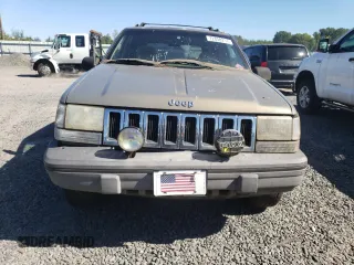 1995 Jeep Grand Cherokee Laredo with VIN 1J4FX58S1SC754691, listed as a Copart auction lot 72858214 with 251,234 mi miles and Salvage Title. Bid and sale history available at carsss.com. Image 5.