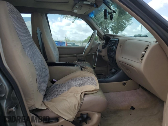 2000 Ford Explorer Eddie Bauer with VIN 1FMZU64E8YZB16294, listed as a Copart auction lot 52494655 with 196,168 mi miles and Salvage title. Bid and sale history available at DreamBid. Image 7.