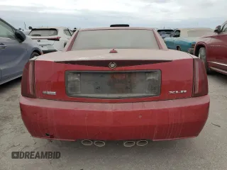 2005 Cadillac XLR z VIN 1G6YV34A855601016, wystawiony jako Copart lot #74436784 z przebiegiem Nie podano mil oraz Szkody całkowita. Historia ofert i sprzedaży dostępna na DreamBid. Obrazek 6.