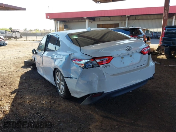 2020 Toyota Camry LE with VIN 4T1C11AK7LU401666, listed as a IAAI auction lot 41865235 with 69,189 mi miles. Bid and sale history available at carsss.com. Image 3.