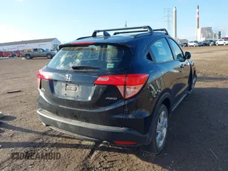 2016 Honda HR-V LX with VIN 3CZRU6H39GM749720, listed as a IAAI auction lot 41864792 with 60,604 mi miles. Bid and sale history available at carsss.com. Image 4.